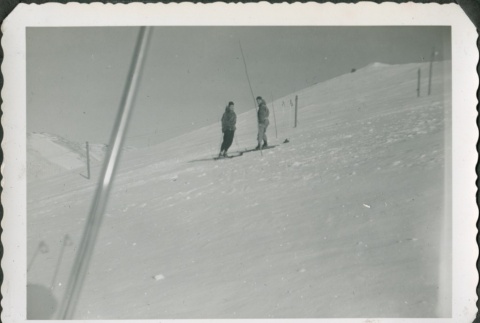 Two men on a ski slope (ddr-densho-321-419)