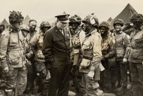 Dwight D. Eisenhower bidding good luck to paratroopers headed to France (ddr-njpa-1-223)