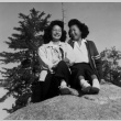 Lilyan Nagata and Mollie Abe sitting on a rock (ddr-densho-336-6)