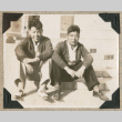 Two men sitting on steps (ddr-densho-383-282)