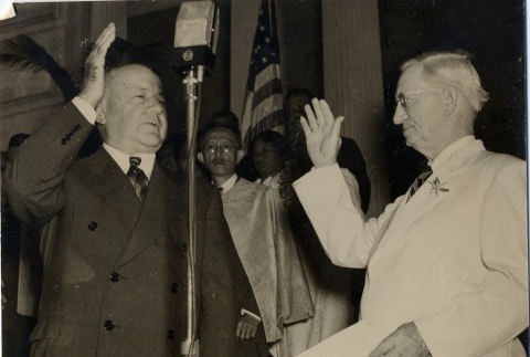 Ingram Stainback taking oath of office from Delbert Metzger (ddr-njpa-2-1190)