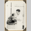 Eddie at work (ddr-densho-542-500)