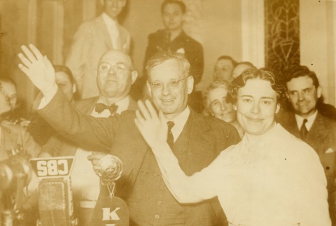 Alfred M. Landon and his wife, Theo Cobb waving at an event (ddr-njpa-1-852)
