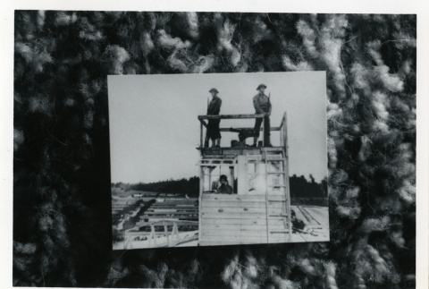 [Guards on duty in guard tower] (ddr-csujad-29-159)