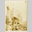 Crowd gathered to watch the HMS Belfast leaving a shipyard (ddr-njpa-13-576)