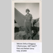 Saburo Arthur Kitagawa standing outside tent (ddr-densho-539-24)