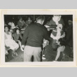 Santa Claus handing out gifts (ddr-densho-37-1303)