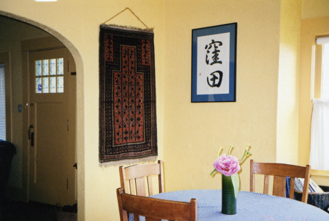 Interior of home with framed Japanese script (ddr-densho-354-1947)