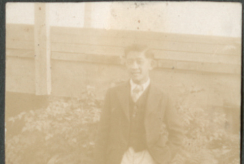 Man standing in yard (ddr-densho-316-205)