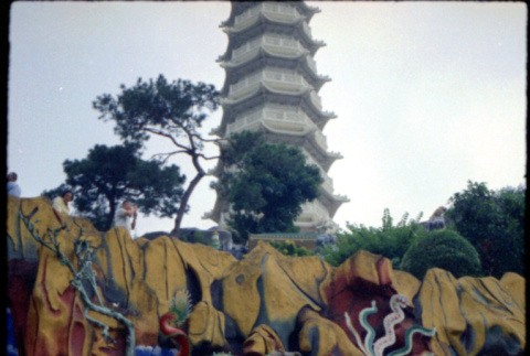 Couple standing in Tiger Balm Garden (ddr-densho-426-754)