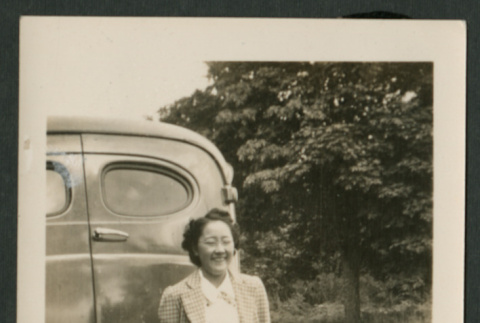 Woman in front of car (ddr-densho-359-166)