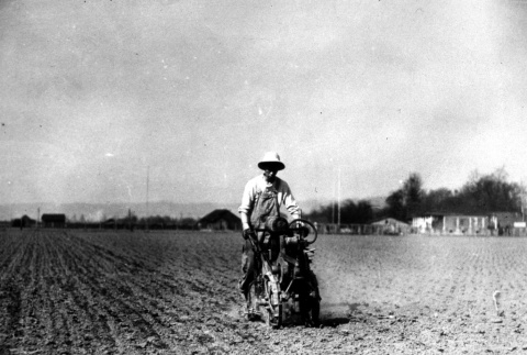 Man working in a field (ddr-densho-18-26)