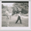 Three men playing a lawn game (ddr-densho-329-824)