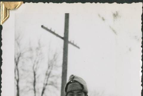 Man in uniform in snow (ddr-densho-434-310)