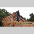 Carpenter Dave Schmidt dressing beams on overlook structure (ddr-densho-354-2288)
