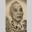 Takejiro Otani wearing leis (ddr-njpa-4-1920)