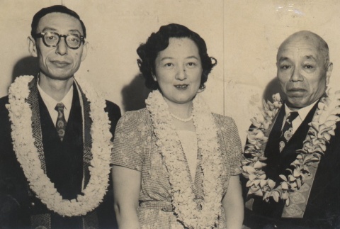 Kocho Otani, his wife, and another Buddhist leader wearing leis (ddr-njpa-4-1901)