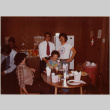 Four people around table (ddr-densho-426-1328)