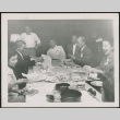 Group sitting around a table (ddr-densho-293-138)