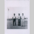 George Nozawa, Kiyoshi Okamoto and unidentified man in camp  (?) (ddr-densho-122-659)