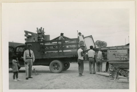 Loading Tule Lake bound home goods (ddr-densho-37-875)