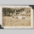 Man laying on grass (ddr-densho-316-250)