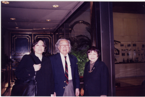 Henri Takakashi in center, with two unknown women (ddr-densho-426-389)