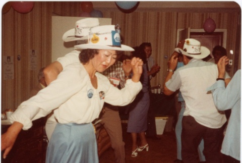 Scene at a hoedown themed party at the 1980 JACL National Convention (ddr-densho-10-46)