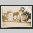 Man and two children on bridge (ddr-densho-550-282)