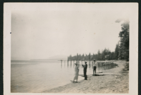 3 people on the shore of Lake Tahoe (ddr-densho-378-408)