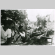 Three relaxing outside (ddr-densho-1007-831)