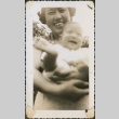 Woman holding a baby (ddr-densho-321-1085)