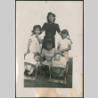 Two woman with two babies and two girls (ddr-densho-316-409)