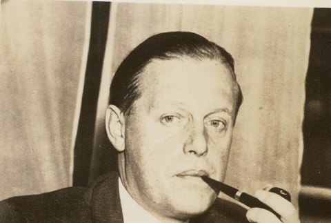 Hans Thomsen smoking a pipe (ddr-njpa-1-2019)
