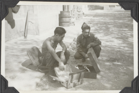 Two men with record player (ddr-densho-466-668)