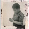 Sansei boy with prayer beads (ddr-densho-325-506)