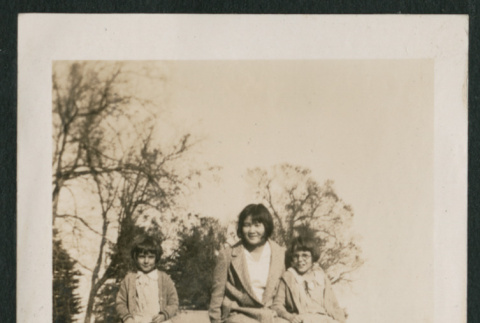 woman and 2 kids on a fence (ddr-densho-378-366)