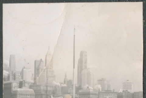 Agnes and Chester Sakura with New York skyline (ddr-densho-523-161)