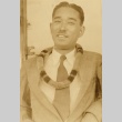 Japanese writer wearing a lei (ddr-njpa-4-1844)