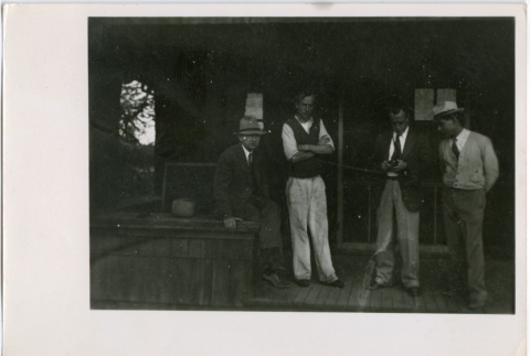 Four men on porch (ddr-densho-377-1641)