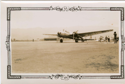 Photo front and back (ddr-densho-426-1930-mezzanine-a3a04ac6dd)