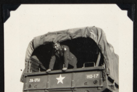 Leo Morishita in a military truck (ddr-densho-542-635)