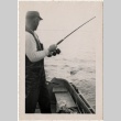 Man fishing in boat (ddr-densho-326-12)