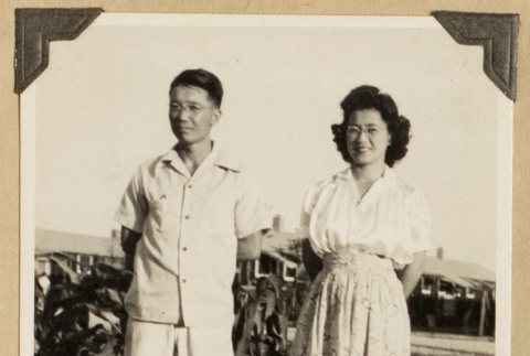 Frank Eye and Mits Kikawa beside a garden (ddr-densho-542-512)