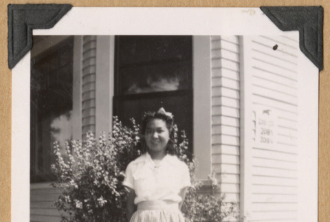 Girl outside a building (ddr-densho-542-225)