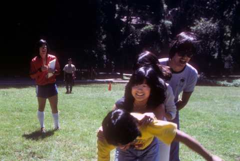 Campers playing a team geta race (ddr-densho-336-1289)