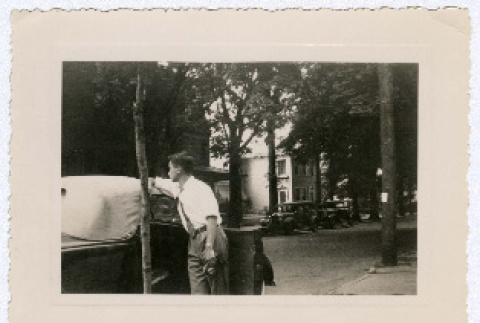 George Rockrise leaning on car (ddr-densho-335-168)