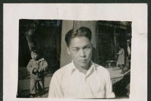 man and tree (ddr-densho-378-313)