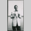 Young man in suit with bowtie (ddr-densho-523-267)