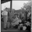 Japanese American family waiting for train (ddr-densho-151-288)